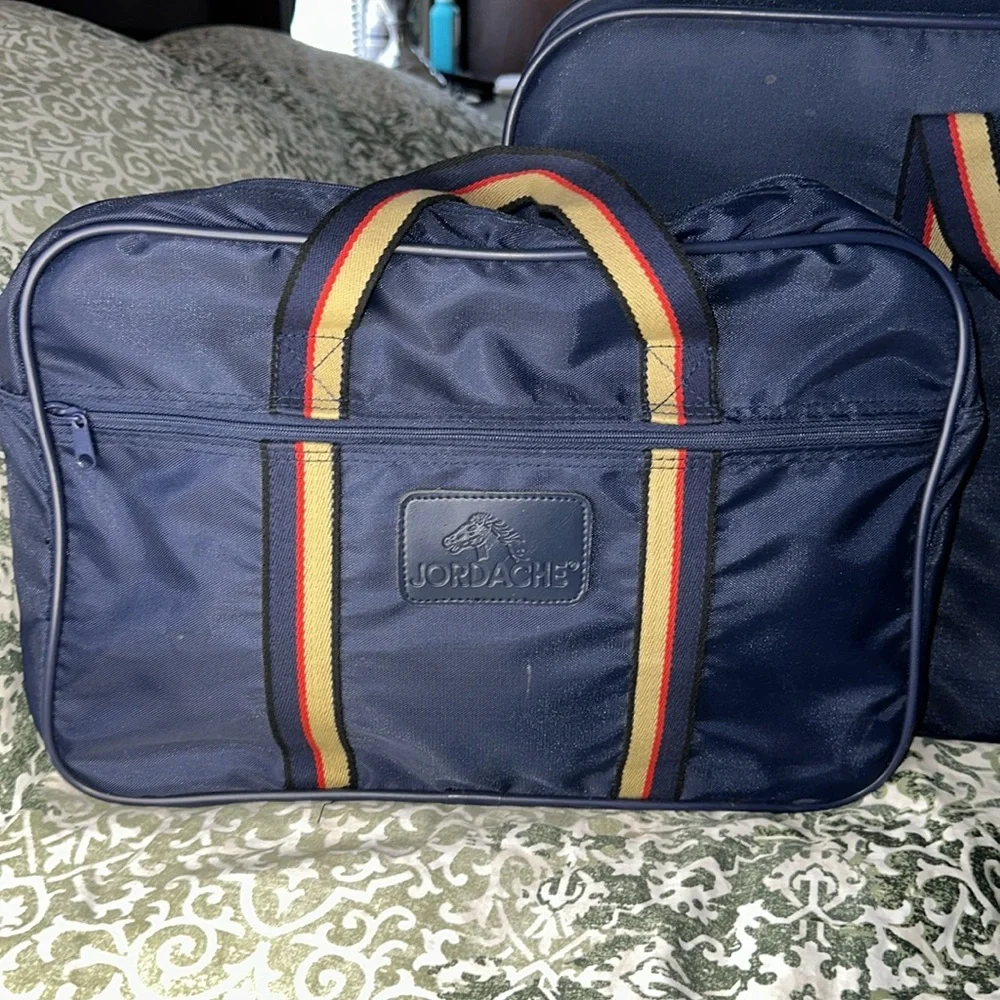 Excellent vintage Jordache blue nylon suitcase collection blue, red & tan handle